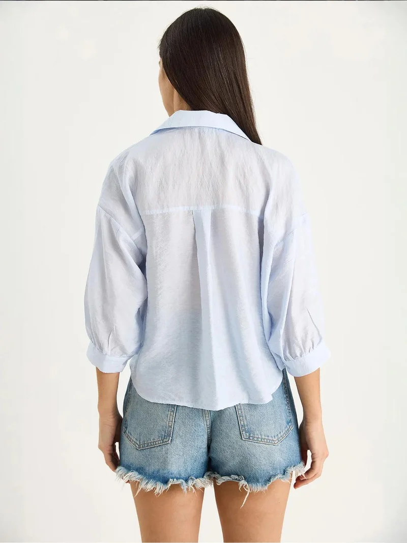 Bianco Lucci Baby Blue LUCCI Textured Crop Shirt with Button Closure and Pocket for Women | Best Price UAE