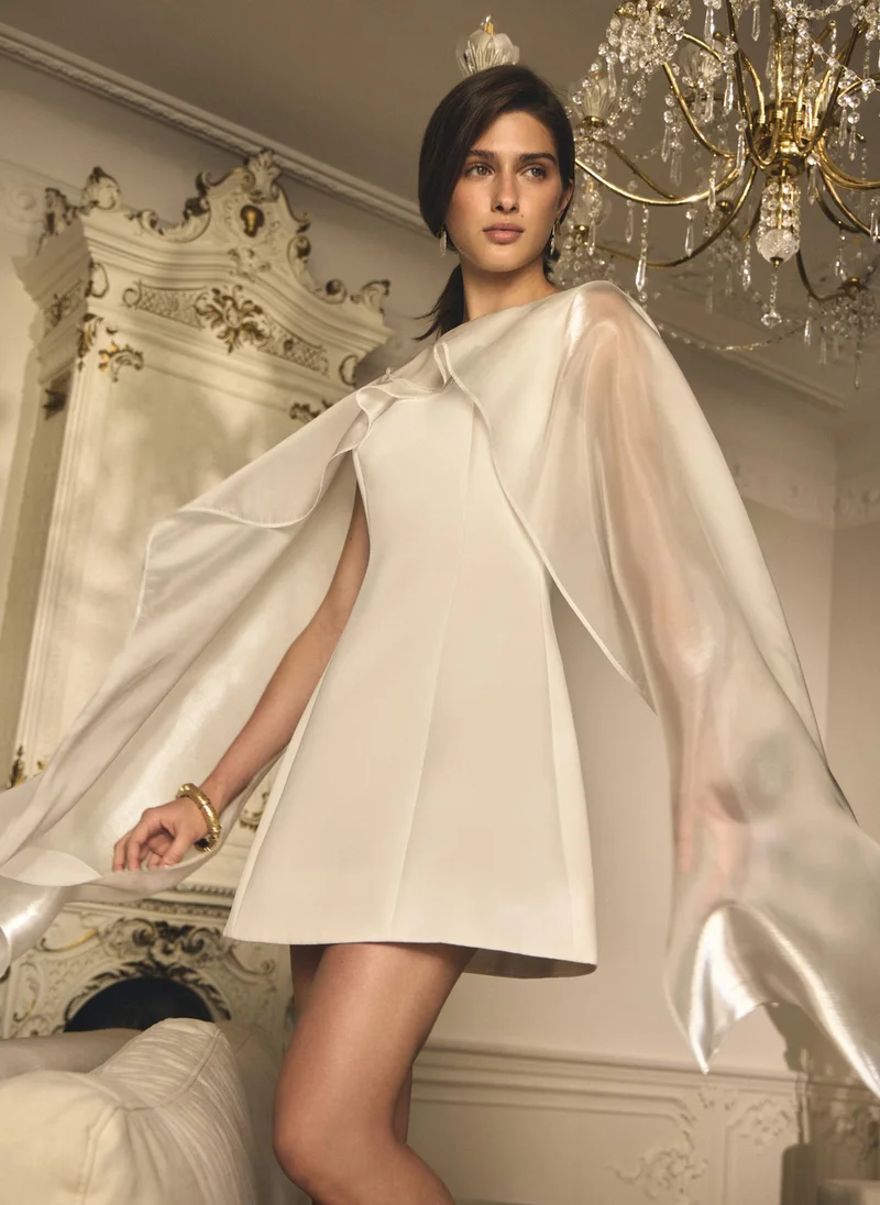 Mini dress with semi-transparent train