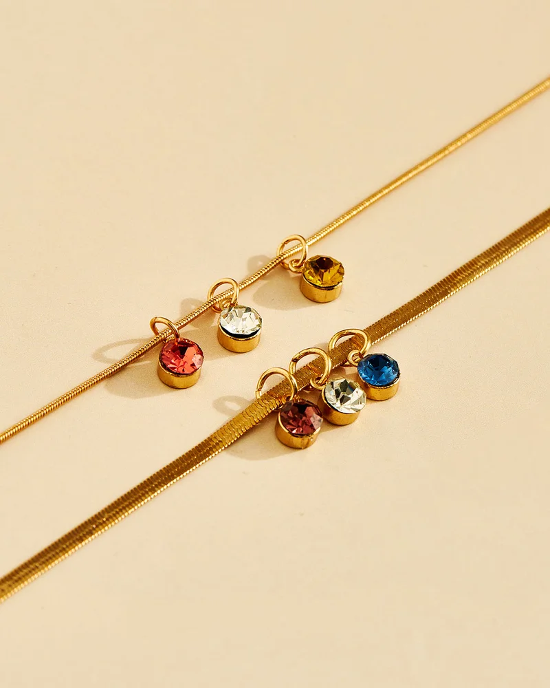 ردتاغ طقم خلخال مزين باللون الذهبي (قطعتان) للنساء