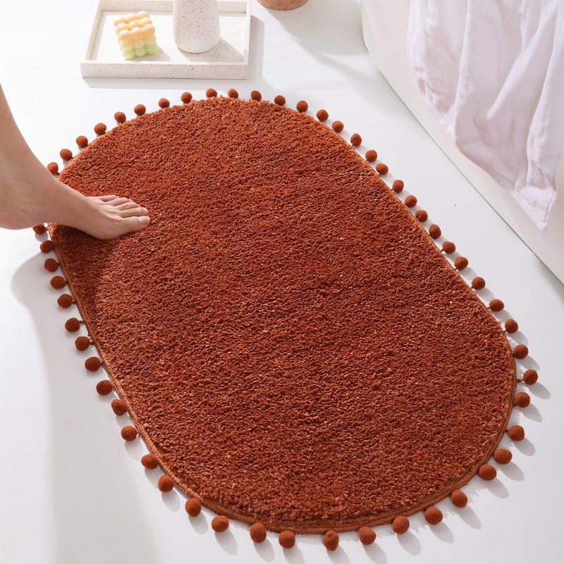 yirddeo terracotta pom bup brug for bathroom non slip boho pom pom orval ustorbent mat plush plush soft sweat (20 × 30 بوصة) - Image 1