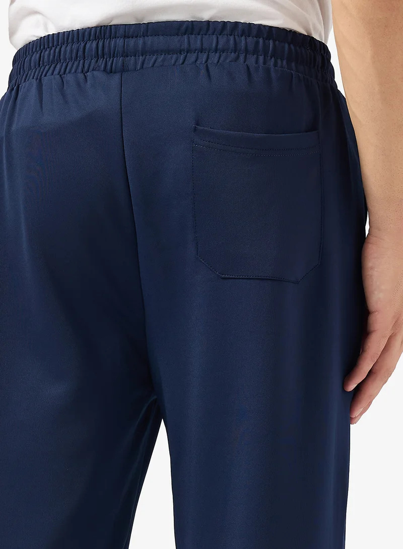 سفنتي فايف بيسيكس Relaxed Fit Emblem Joggers