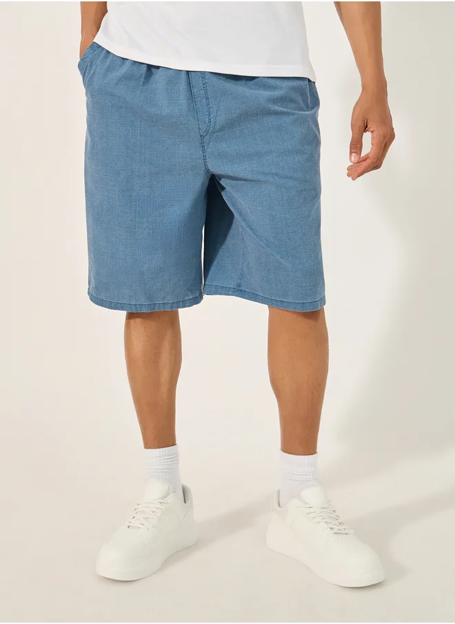 Styli Styli Mid Rise Stretch Loose Fit Woven Shorts