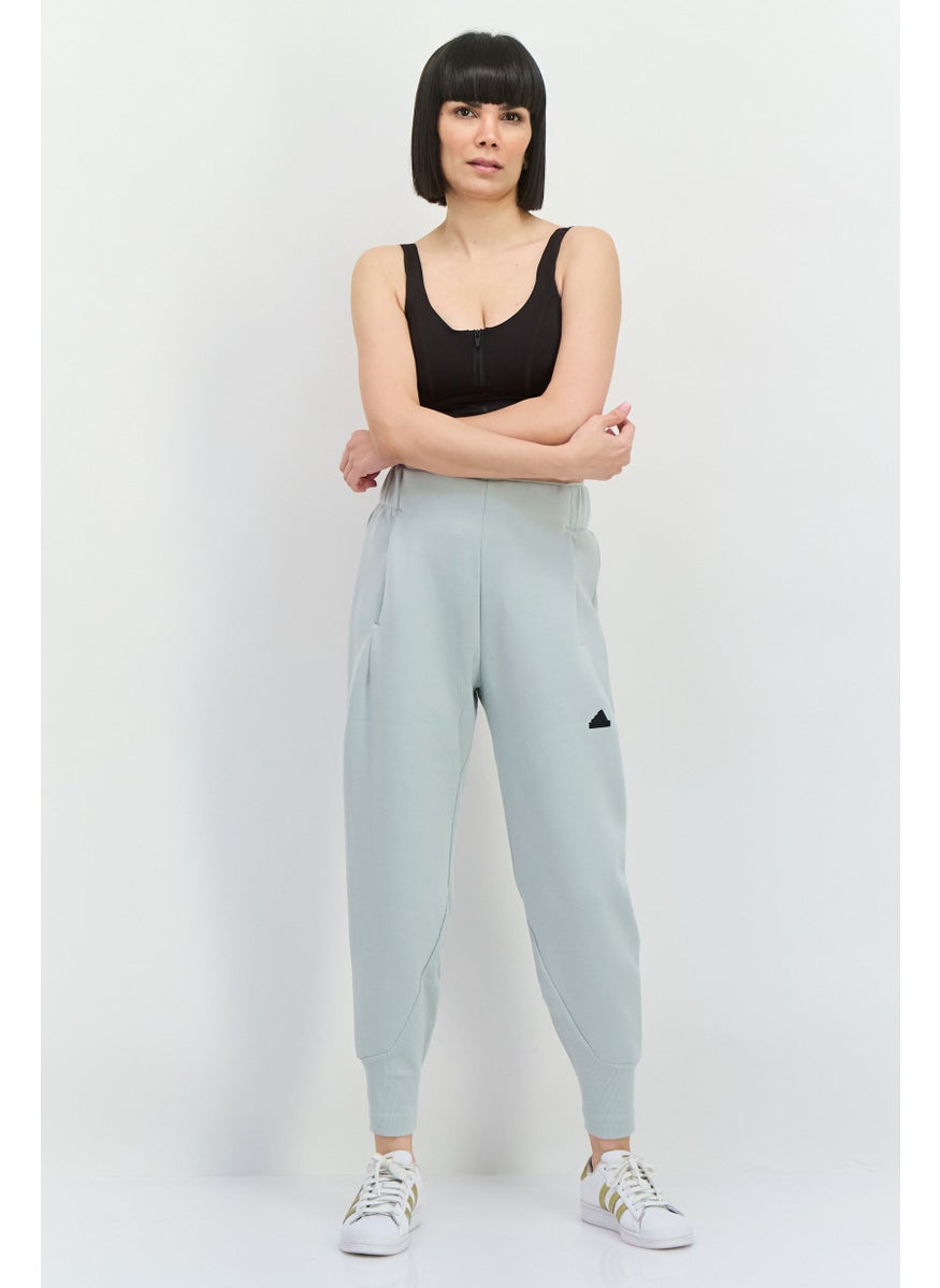 Adidas - Women Regular Fit Brand Logo Outdoor Sweatpant, Light Grey - Image 1