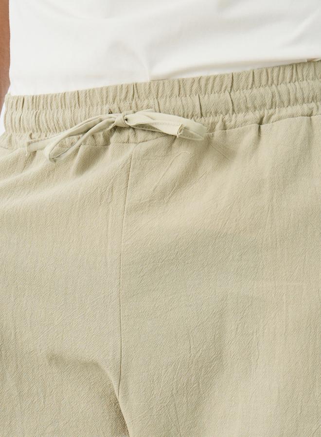 ستايلي سراويل منسوجة بخصر برباط بقصة مريحة - Image 3