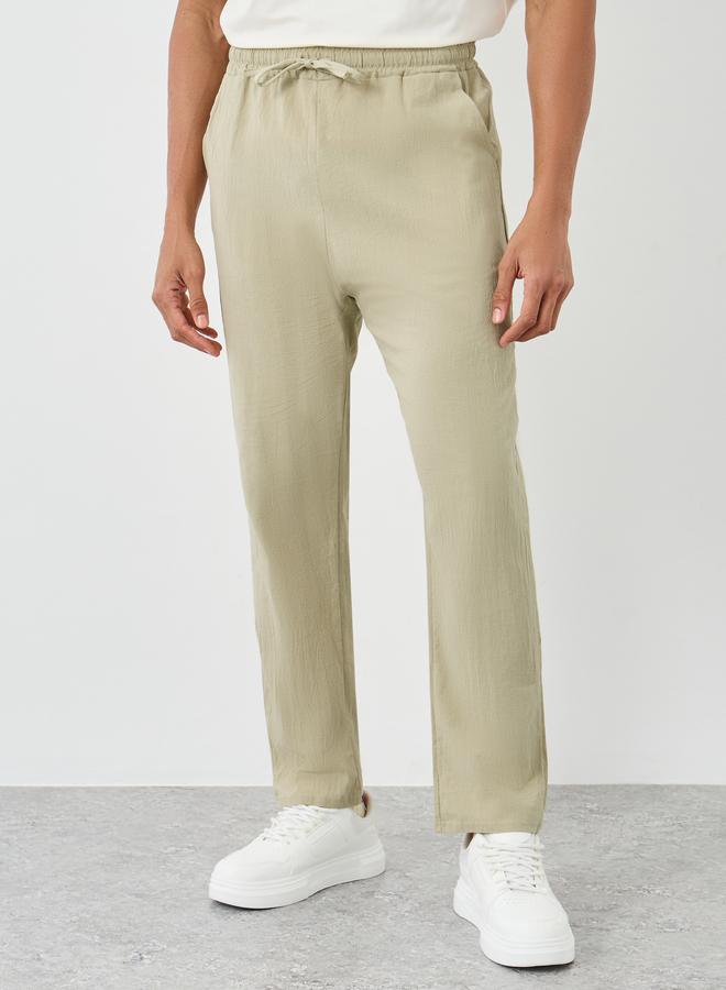 ستايلي سراويل منسوجة بخصر برباط بقصة مريحة - Image 1