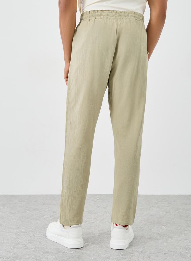 ستايلي سراويل منسوجة بخصر برباط بقصة مريحة - Image 4