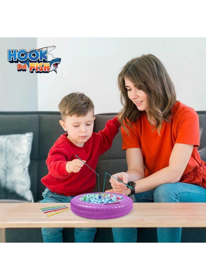 سكودل لعبة صيد السمك القابلة لإعادة الشحن من SKOODLE Quest Hook Da Fish | 45 سمكة و4 صنارات صيد | لعبة صيد السمك الدوارة الموسيقية | مناسبة لعمر 5 سنوات فما فوق | لون أرجواني - Image 4