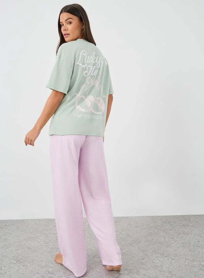 ستايلي Styli Slogan Print Short Sleeve T-Shirt and Pyjama Set