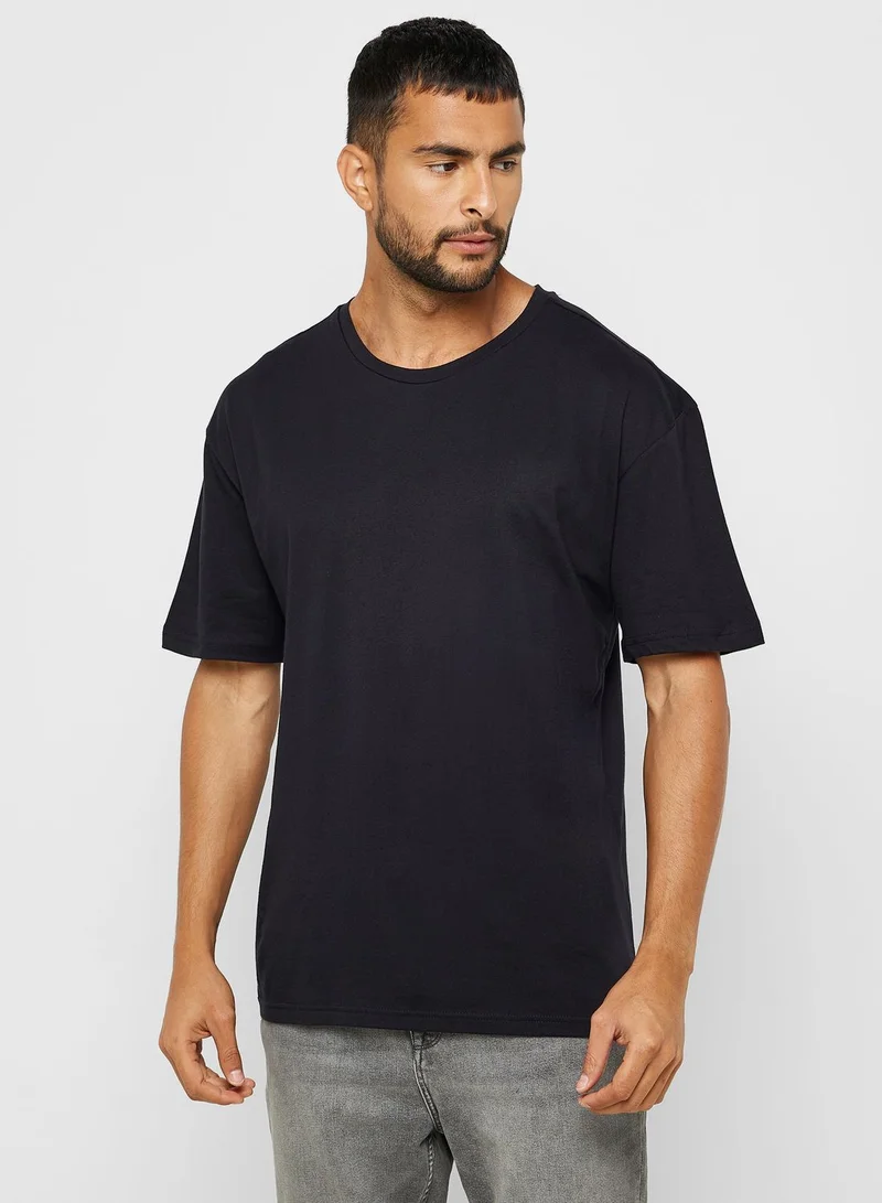 جون تيشيرت اساسي اوفر سايز وفتحة رقبة مستديرة