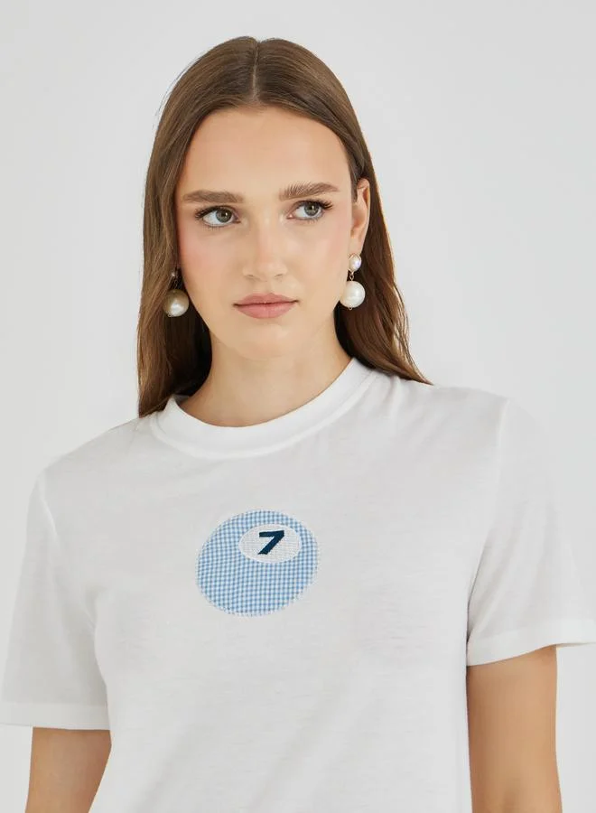 تايك تو تيشيرت دائري مطرز من تايك تو