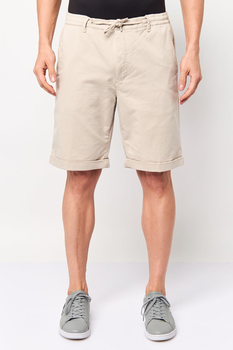 Celio Men Solid Basic Shorts, Beige - Image 1