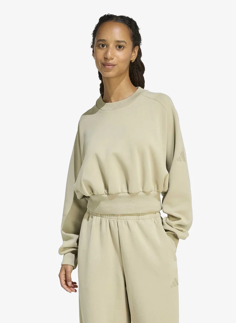 اديداس سويت شيرت فضفاض فاخر ناعم