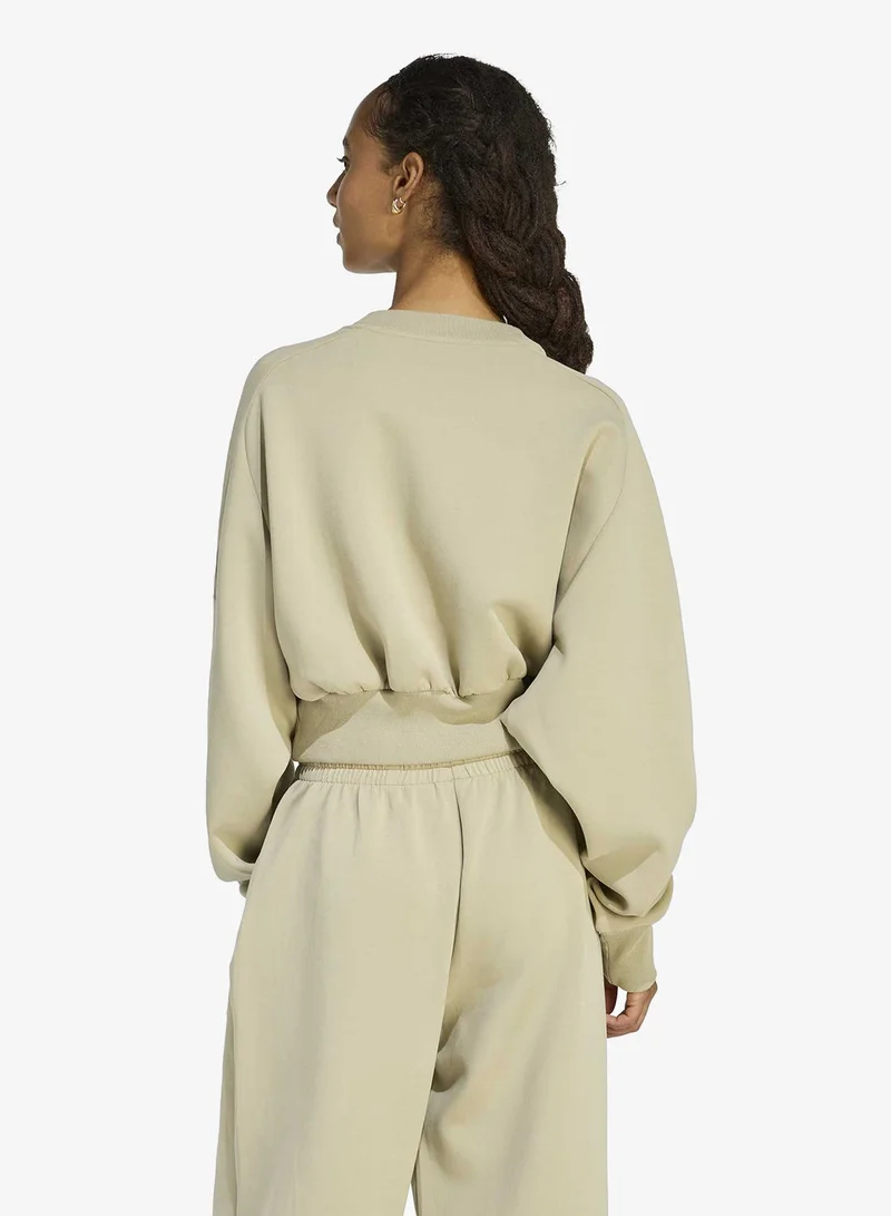 اديداس سويت شيرت فضفاض فاخر ناعم