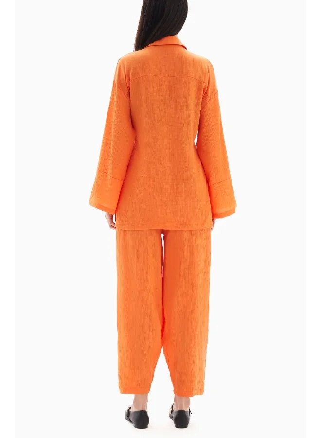 Wecre8 Orange Textured Set of Blouse with Trousers