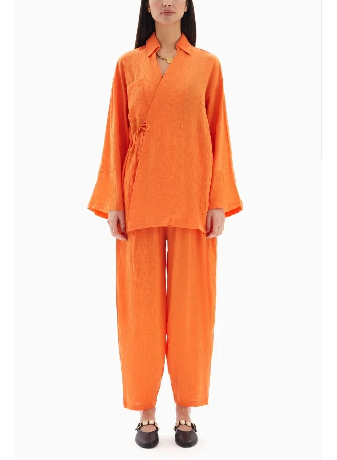 Wecre8 Orange Textured Set of Blouse with Trousers
