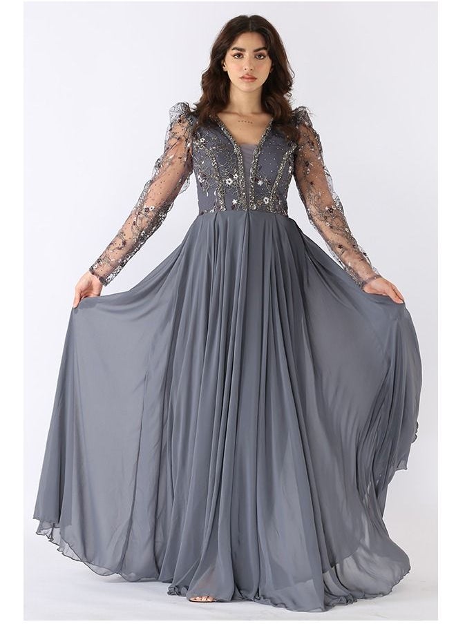 Dentek - Long evening dress of chiffon material, embroidered with a belted computer from the bottom, with a cloche cut - Image 1