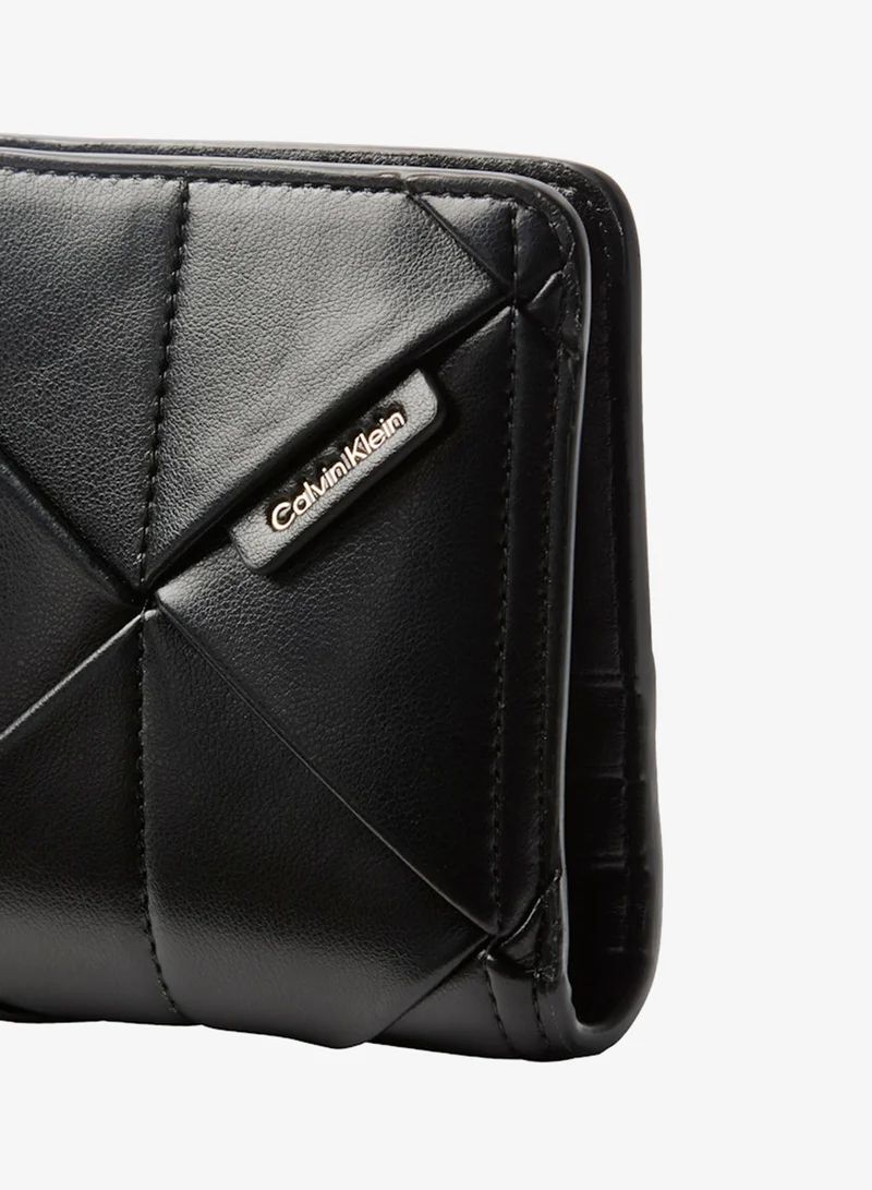 Calvin Klein Black Patchwork Logo Passport Wallet for Women | Best Price UAE