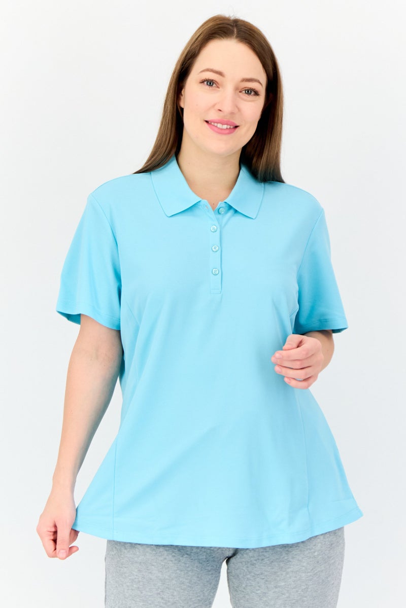 Greg Norman Women Sportswear Fit Solid Short Sleeve Outdoor Polo Shirt, Light Blue  - Image 1