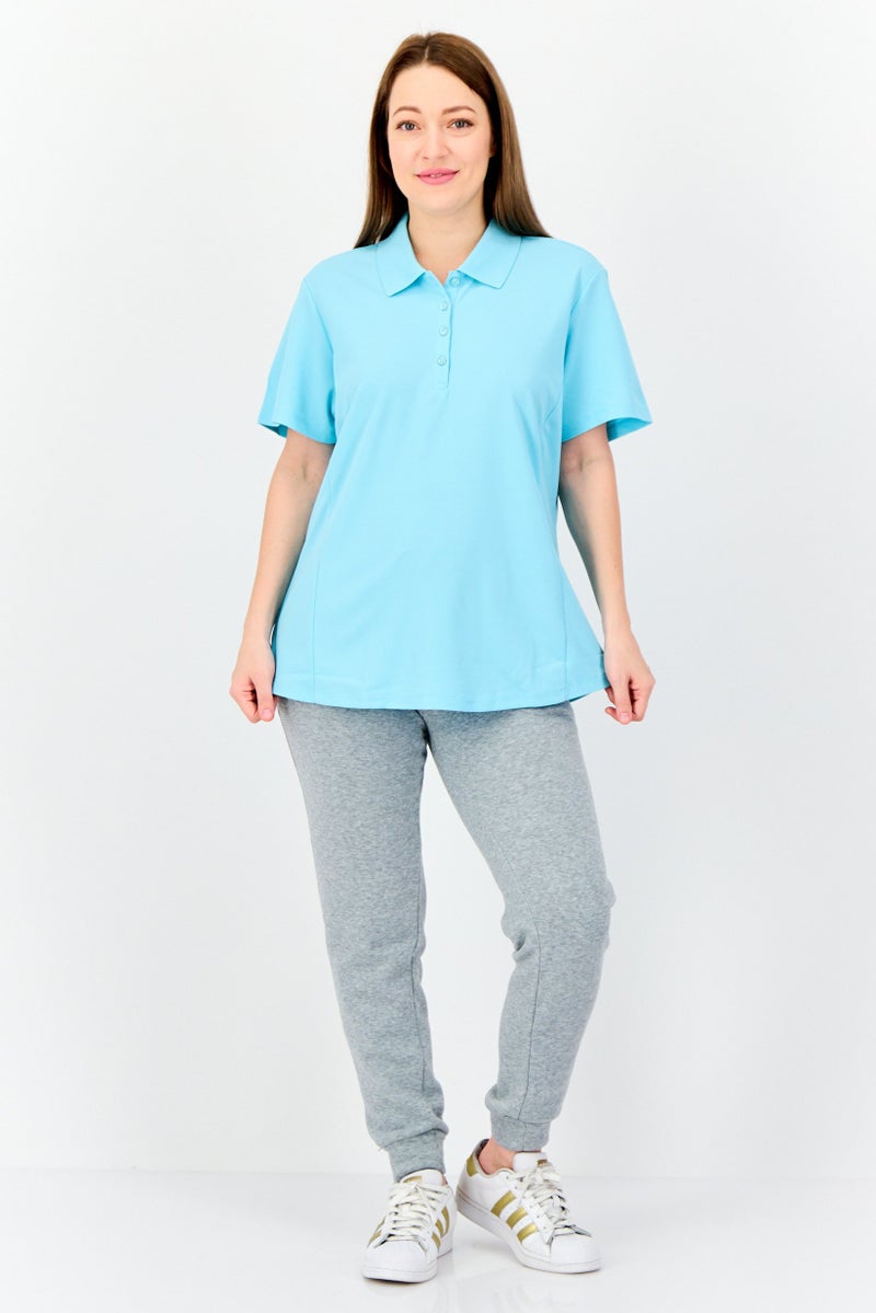 Greg Norman Women Sportswear Fit Solid Short Sleeve Outdoor Polo Shirt, Light Blue  - Image 2
