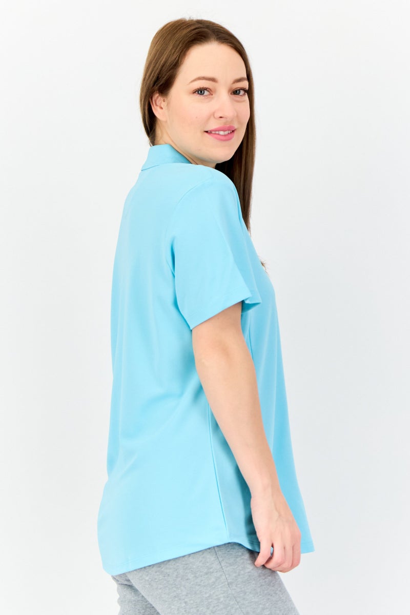 Greg Norman Women Sportswear Fit Solid Short Sleeve Outdoor Polo Shirt, Light Blue  - Image 4