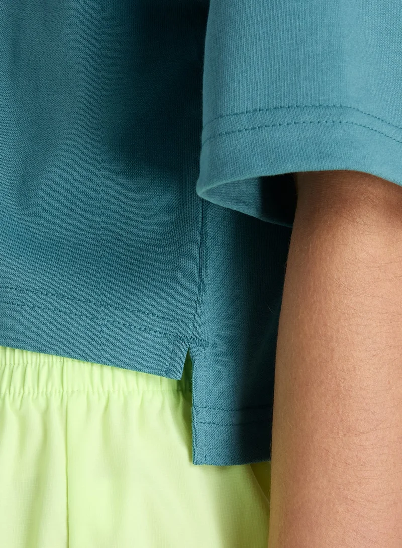 New Balance BIG TEAL (AAZ) Athletics Premium Chest Logo Cropped T-Shirt for Women | Best Price UAE
