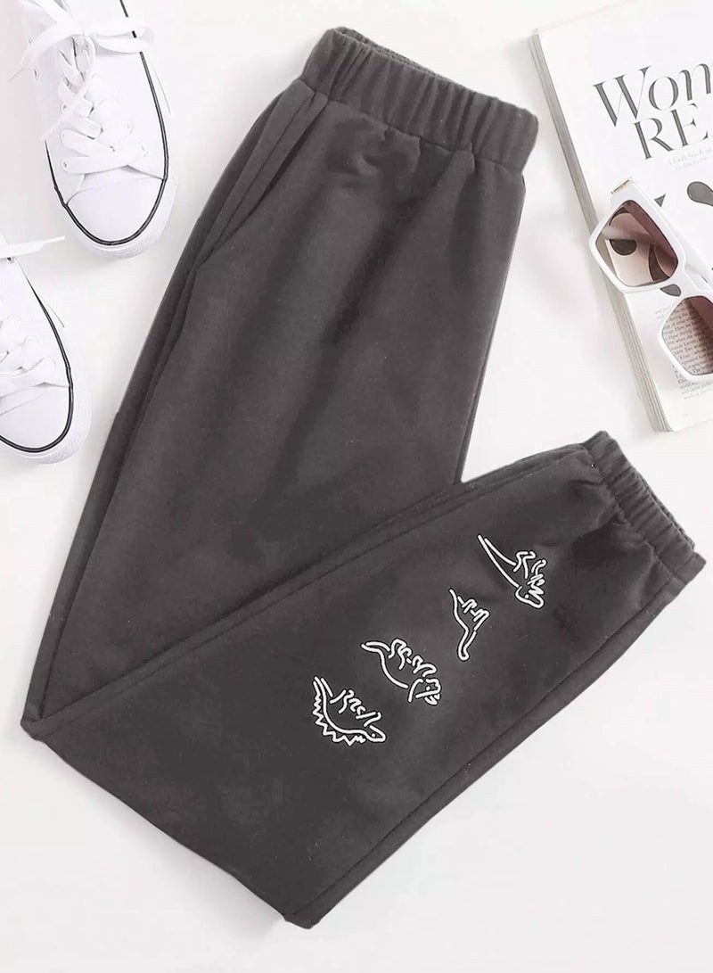 بنطال رياضي برسومات ديناصورات كرتونية