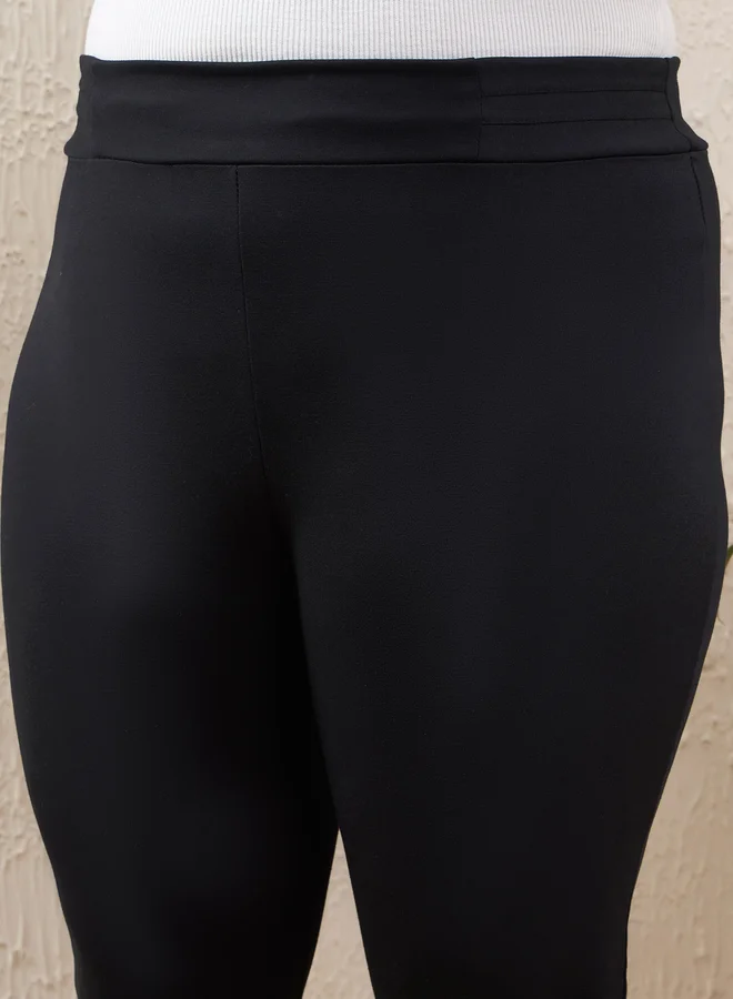 SASSAFRAS Plus Size High Rise Side Zipper Hem Jeggings