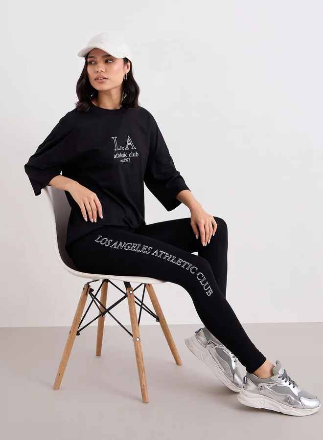 Styli Styli Women Black Printed Oversized T-Shirt and Leggings Set