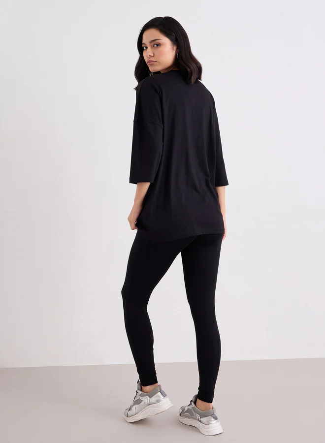 Styli Styli Women Black Printed Oversized T-Shirt and Leggings Set