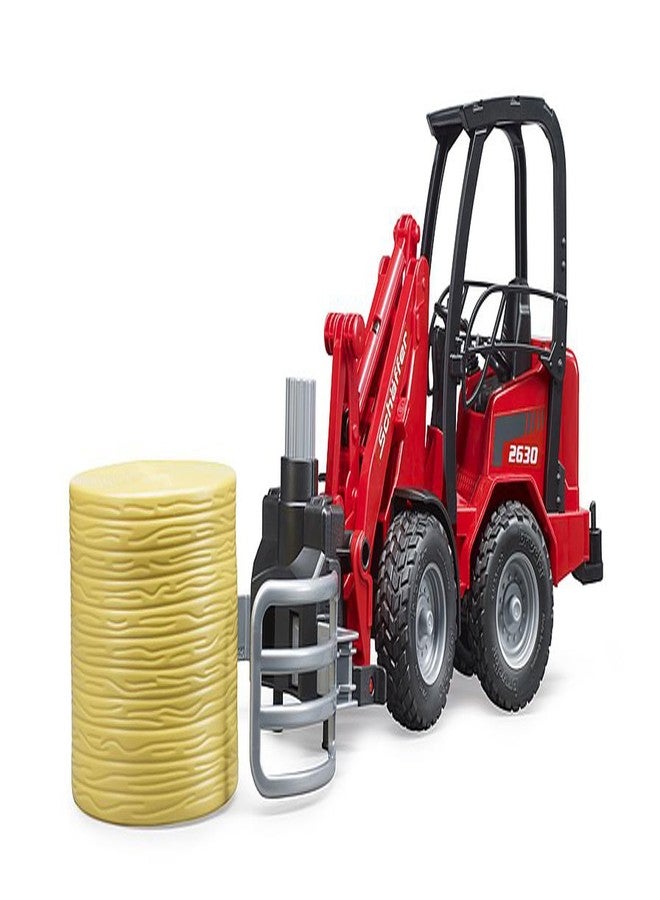 Bruder Schaeffer Compact Loader 2034 w Bale Gripper and Bale - Image 5