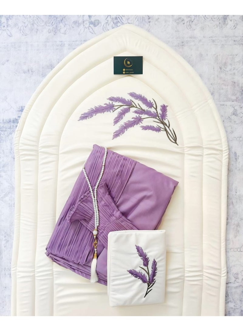 A distinctive and wonderful prayer set consisting of (a prayer rug embroidered with a lavender design and lined, a prayer dress with wonderful pleats, and a beaded rosary) - Image 1