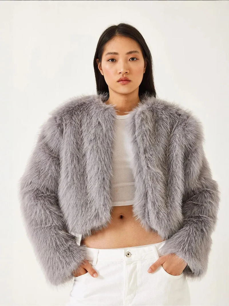 بيانكو لوتشي معطف فرو صناعي قصير من لوكسي