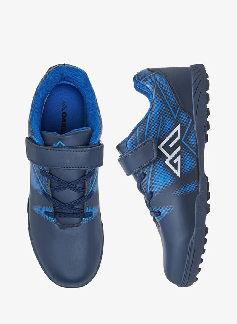 شو اكسبرس أحذية كرة قدم للأولاد بطبعات وشريط لاصق