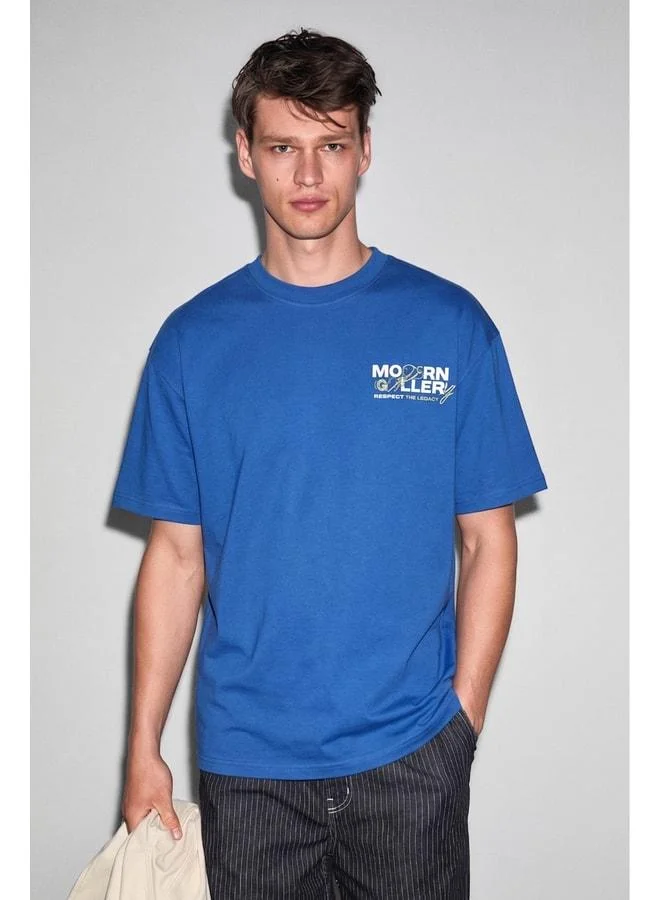 GRIMELANGE COLIBRI Men's T-Shirt with Front and Back Print, Detailed Oversized Short Sleeve Bike Collar, Organic Cotton, Blue.