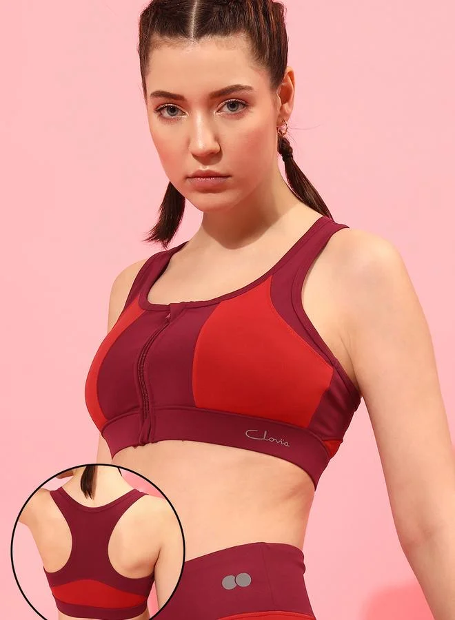 Clovia Medium Impact Padded Color Block Racerback Sports Bra