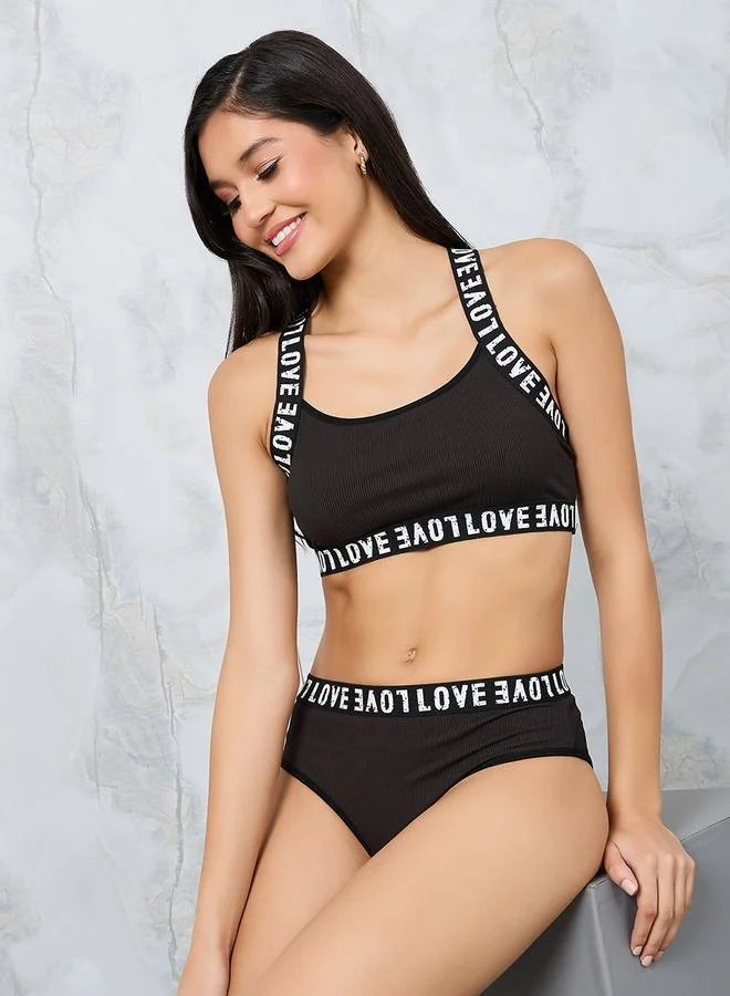 Styli Non Padded Non Wired Love Text Elastic Ribbed Crop Top & Bikini Set