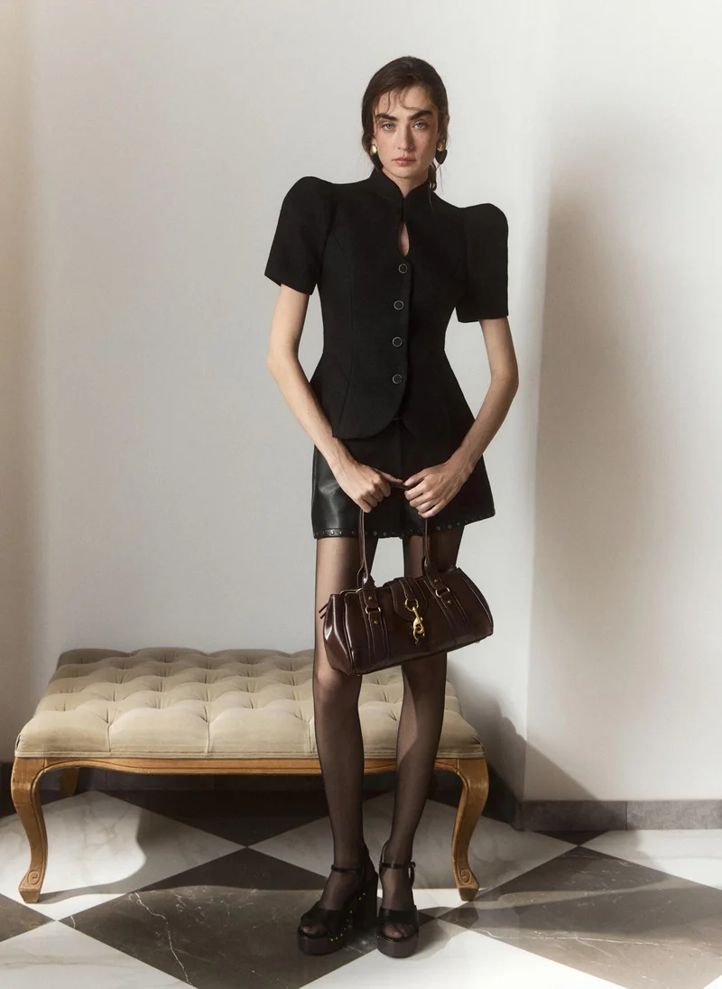 Textured fabric jacket with voluminous short sleeves