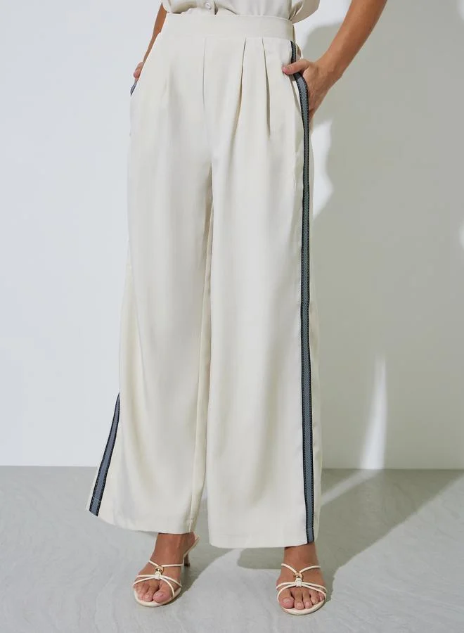 Styli Off White Solid Wide Leg Pants with Side Lace Detail