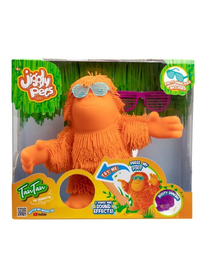 إيولو - لعبة إنسان الغاب المطاطي الراقص Tan-Tan من Jiggly Pets Kids، حركة الجسم بالكامل، هز المؤخرة، موسيقى الغابة، تأثيرات صوتية، شعر مطاطي رائع، برتقالي لامع، للأعمار من 4 سنوات فما فوق - Image 1