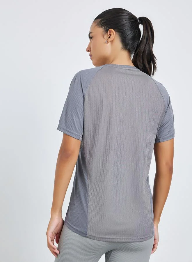 Styli Active Grey Textured Panelled Short Sleeves Top for Women | Best Price UAE