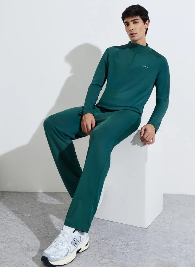 Styli Active Dark Green Solid Half Zip Long Sleeves Top and Track Pants Active Set