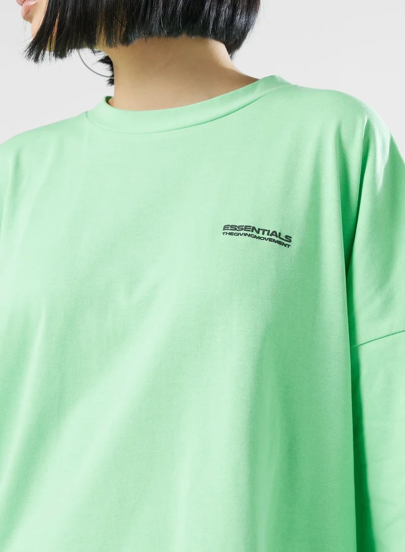 The Giving Movement Exaggerated Logo T-Shirt