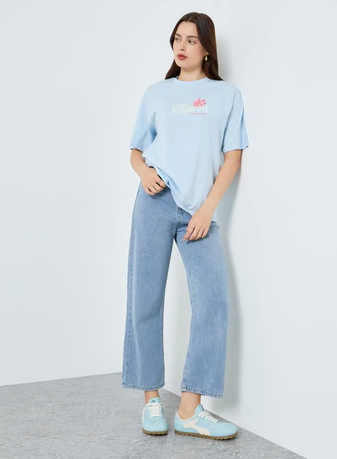 Styli Women Blue Oversized Graphic Print T-Shirt