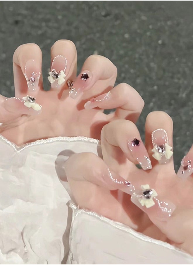 NIBEMINENT 30Pcs Fake Nails, Press Nails In Box,Long-length Flat head shaped Solid Skin Color Shiny Nail Art,Bow knot Love Heart Star zircon Pearl,Fake Nail Patch  - Image 1