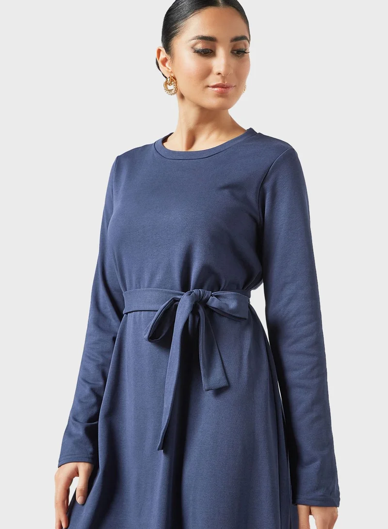 Desert Cove Belted Ruffle Hem Dress