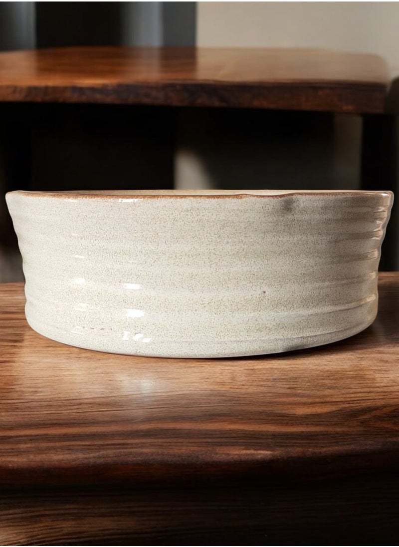 Generic A ceramic and porcelain tray that can withstand direct and indirect heat, from a flame or inside the oven.  - Image 1