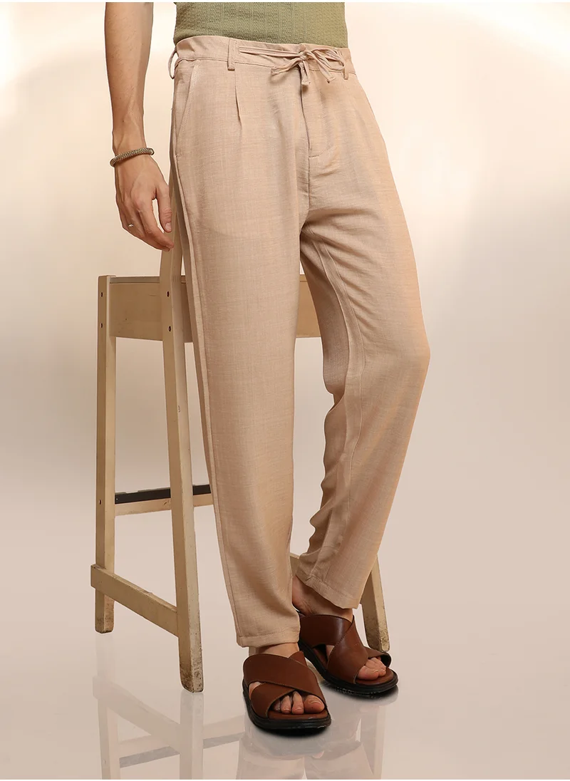 Campus Sutra Men's Saltbox Beige Solid Pleated Trousers