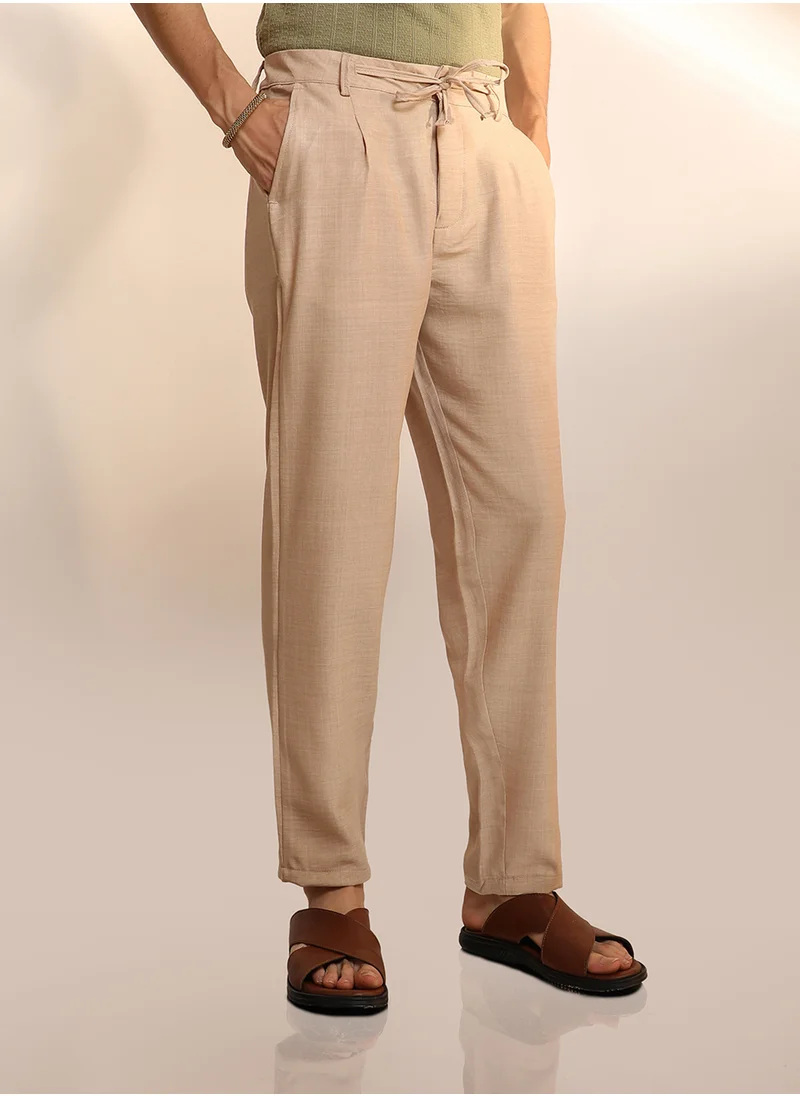 Campus Sutra Men's Saltbox Beige Solid Pleated Trousers