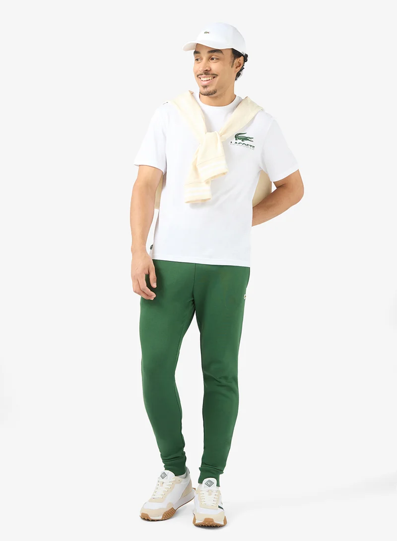 لاكوست بنطلون رياضي بخصر مطاطي ونسيج ناعم