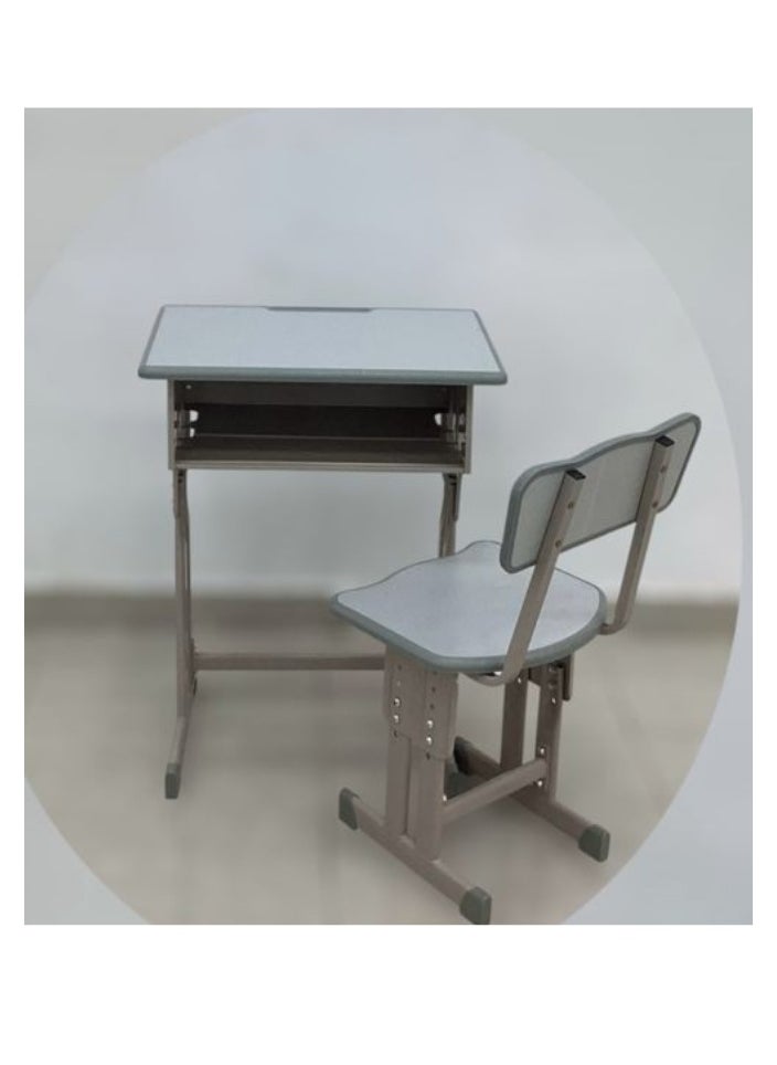 A children's study desk set consisting of 4 pieces (two tables and two chairs), a chair and a study table An educational desk set made of iron and fiber